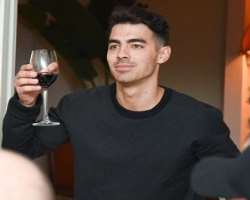 Joe Jonas consuming alcohol Joe Jonas consuming alcohol